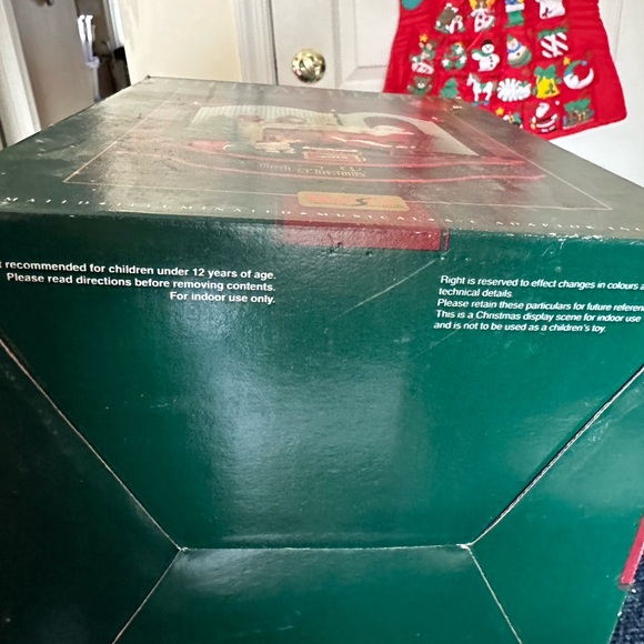 Cute Santa scene. Santa rocks and an elf looks at a box of toys. Missing cord. - Picture 3 of 12